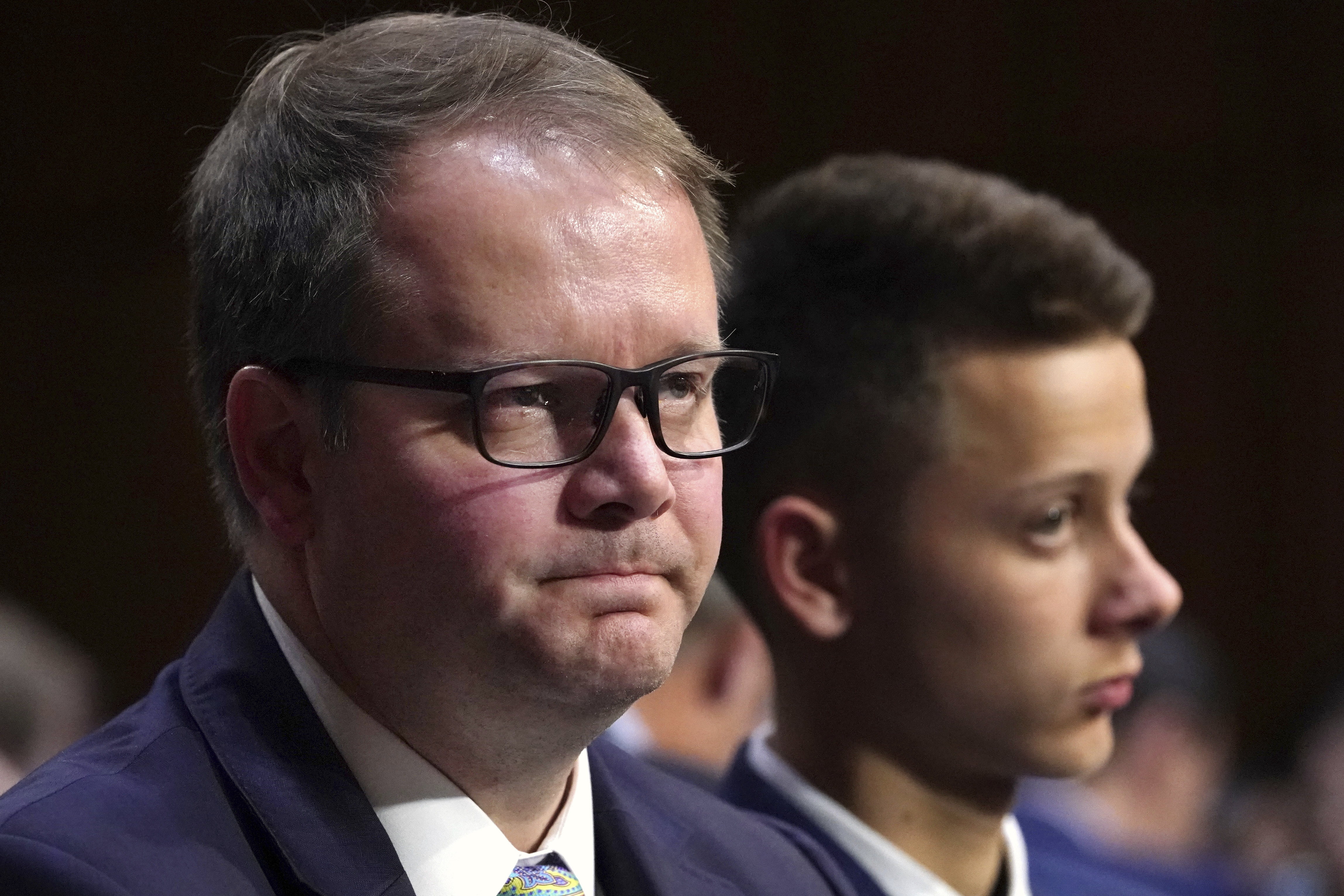FILE - In this March 14, 2018 file photo, Ryan Petty, left, waits to testify as he sits next to his son Patrick Petty, at a Senate Judiciary Committee hearing on the Parkland, Fla., school shootings and school safety on Capitol Hill in Washington. Petty and Andrew Pollack, two parents who lost daughters in last year's school shooting are calling for their local newspaper to win the Pulitzer Prize. They say the South Florida Sun Sentinel has stayed on the story to demand accountability long after the national media left. (AP Photo/Jacquelyn Martin, File) FILE - In this March 14, 2018 file photo, Ryan Petty, left, waits to testify as he sits next to his son Patrick Petty, at a Senate Judiciary Committee hearing on the Parkland, Fla., school shootings and school safety on Capitol Hill in Washington. Petty and Andrew Pollack, two parents who lost daughters in last year's school shooting are calling for their local newspaper to win the Pulitzer Prize. They say the South Florida Sun Sentinel has stayed on the story to demand accountability long after the national media left. (AP Photo/Jacquelyn Martin, File)