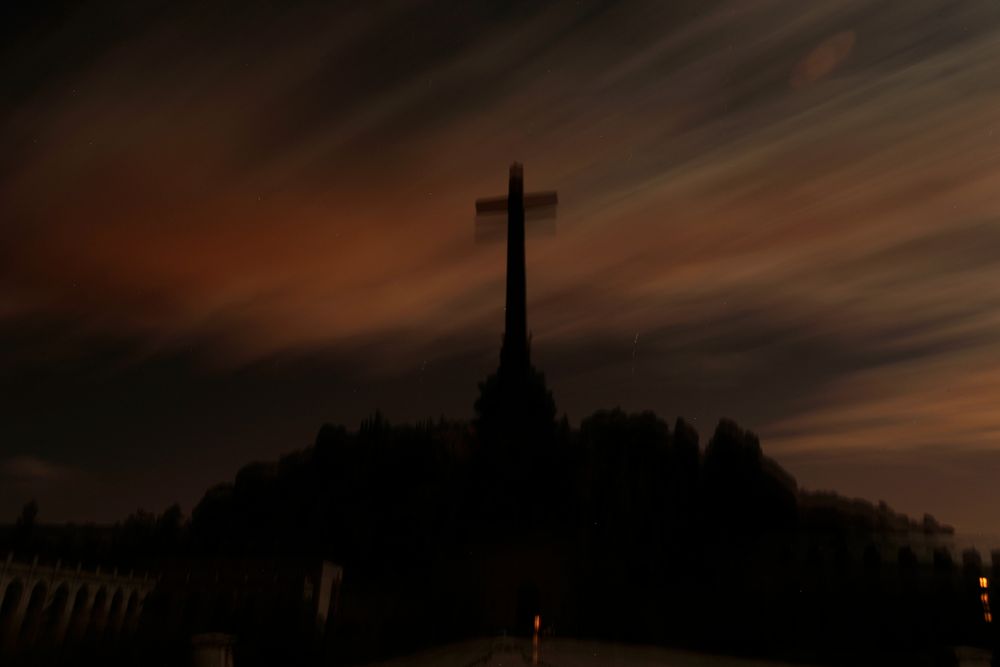 In this photo taken on Monday, Oct. 14, 2019, Guardia Civil officers stand guard in front of The Valley of the Fallen mausoleum near El Escorial, outskirts of Madrid, After a tortuous judicial and public relations battle, Spain's Socialist government has announced that Gen. Francisco Franco's embalmed body will be relocated from a controversial shrine to a small public cemetery where the former dictator's remains will lie along with his deceased wife. (AP Photo/Manu Fernandez) In this photo taken on Monday, Oct. 14, 2019, Guardia Civil officers stand guard in front of The Valley of the Fallen mausoleum near El Escorial, outskirts of Madrid, After a tortuous judicial and public relations battle, Spain's Socialist government has announced that Gen. Francisco Franco's embalmed body will be relocated from a controversial shrine to a small public cemetery where the former dictator's remains will lie along with his deceased wife. (AP Photo/Manu Fernandez)