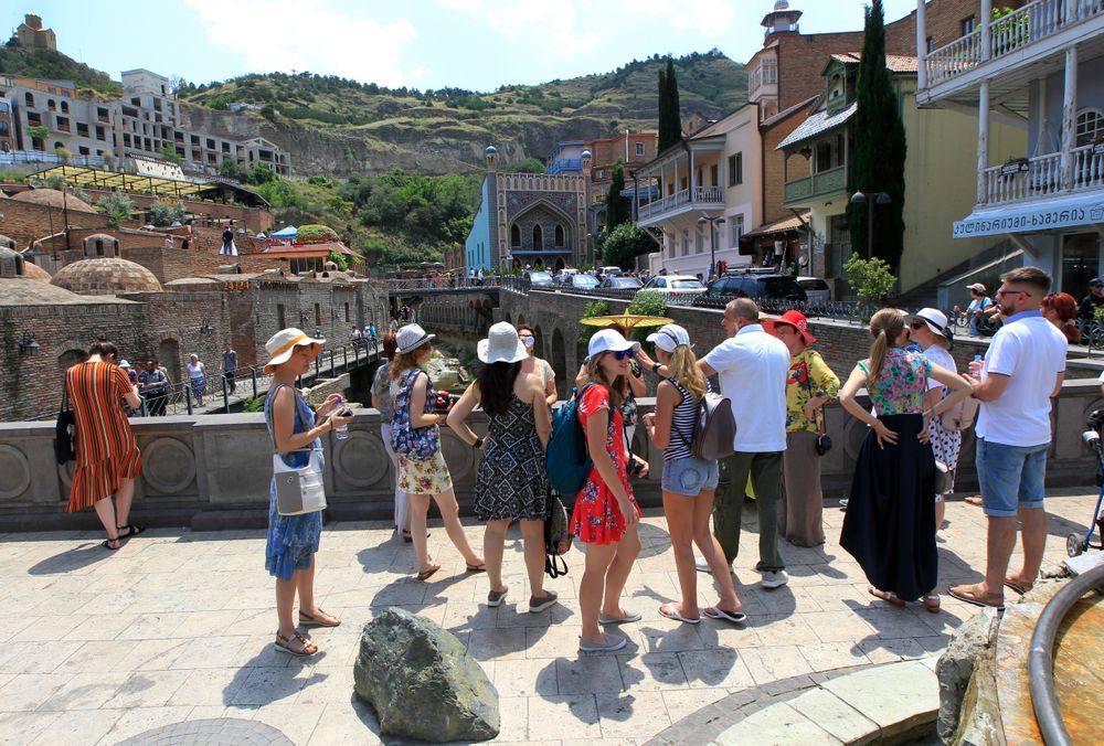 A soup of Russian tourists listen to a guide in The Old Town of Tbilisi, Russia, Saturday, June 22, 2019. Kremlin spokesman Dmitry Peskov noted that thousands of Russian tourists vacationing were in Georgia, as a reason of Moscow's concern about what he described as an anti-Russian A soup of Russian tourists listen to a guide in The Old Town of Tbilisi, Russia, Saturday, June 22, 2019. Kremlin spokesman Dmitry Peskov noted that thousands of Russian tourists vacationing were in Georgia, as a reason of Moscow's concern about what he described as an anti-Russian