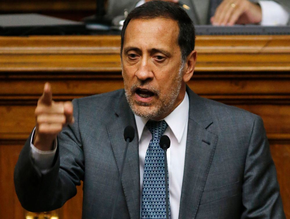 FILE - In this Jan. 22, 2016 file photo, opposition lawmaker Jose Guerra speaks during National Assembly session in Caracas, Venezuela. On Monday, Aug. 12, 2019, Venezuela’s supreme court stripped Guerra and two other opposition lawmakers of immunity from prosecution as accused traitors amid rising political tension in the crisis-stricken nation. (AP Photo/Ariana Cubillos, File) FILE - In this Jan. 22, 2016 file photo, opposition lawmaker Jose Guerra speaks during National Assembly session in Caracas, Venezuela. On Monday, Aug. 12, 2019, Venezuela’s supreme court stripped Guerra and two other opposition lawmakers of immunity from prosecution as accused traitors amid rising political tension in the crisis-stricken nation. (AP Photo/Ariana Cubillos, File)