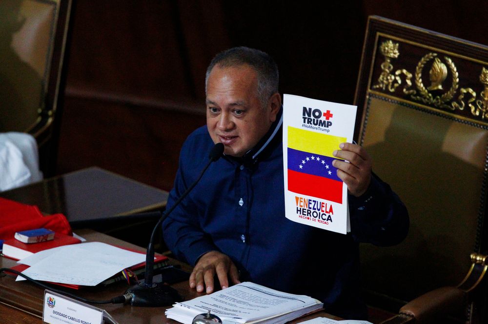 Venezuela's President of the National Constituent Assembly Diosdado Cabello holds up a sign that in Spanish says Venezuela's President of the National Constituent Assembly Diosdado Cabello holds up a sign that in Spanish says