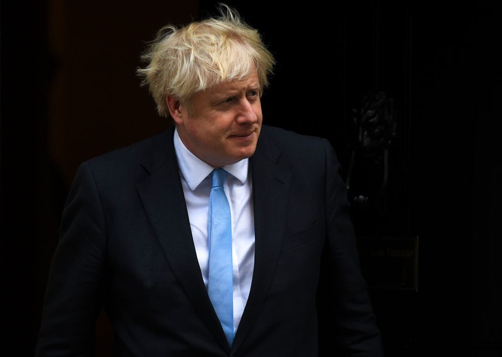 Britain's Prime Minister Boris Johnson walks out 10 Downing Street to greet the US Vice President Mike Pence, in London, Thursday, Sept. 5, 2019.(AP Photo/Alberto Pezzali) Britain's Prime Minister Boris Johnson walks out 10 Downing Street to greet the US Vice President Mike Pence, in London, Thursday, Sept. 5, 2019.(AP Photo/Alberto Pezzali)