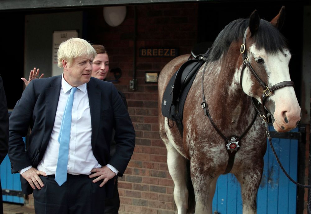 Britain's Prime Minister Boris Johnson looks on during a visit to West Yorkshire in England, Thursday, Sept. 5, 2019. Prime Minister Boris Johnson kept up his push Thursday for an early general election as a way to break Britain's Brexit impasse, as lawmakers moved to stop the U.K. leaving the European Union next month without a divorce deal. (Danny Lawson/PA via AP) Britain's Prime Minister Boris Johnson looks on during a visit to West Yorkshire in England, Thursday, Sept. 5, 2019. Prime Minister Boris Johnson kept up his push Thursday for an early general election as a way to break Britain's Brexit impasse, as lawmakers moved to stop the U.K. leaving the European Union next month without a divorce deal. (Danny Lawson/PA via AP)