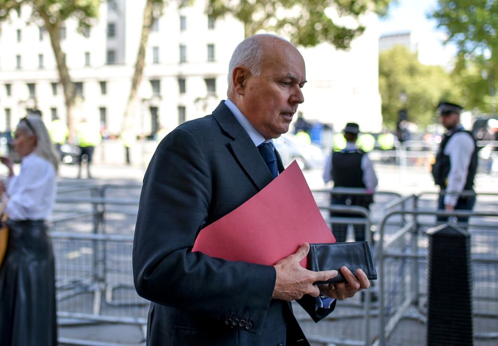 Conservative Party MP Iain Duncan Smith walks past the gates of Downing Street, in London, Thursday, Sept. 5, 2019. Prime Minister Boris Johnson kept up his push Thursday for an early general election as a way to break Britain's Brexit impasse, as lawmakers moved to stop the U.K. leaving the European Union next month without a divorce deal. (AP Photo/Alberto Pezzali) Conservative Party MP Iain Duncan Smith walks past the gates of Downing Street, in London, Thursday, Sept. 5, 2019. Prime Minister Boris Johnson kept up his push Thursday for an early general election as a way to break Britain's Brexit impasse, as lawmakers moved to stop the U.K. leaving the European Union next month without a divorce deal. (AP Photo/Alberto Pezzali)
