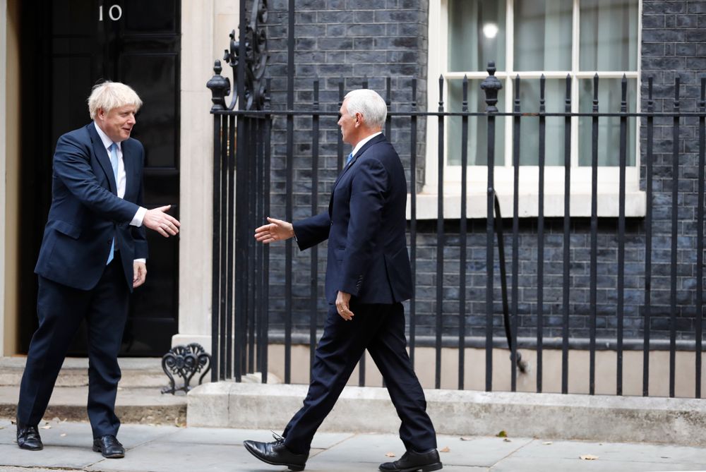 British Prime Minister Boris Johnson, left, welcomes U.S. Vice President Mike Pence prior to a meeting at Downing Street in London, Thursday, Sept. 5, 2019. (AP Photo/Alastair Grant) British Prime Minister Boris Johnson, left, welcomes U.S. Vice President Mike Pence prior to a meeting at Downing Street in London, Thursday, Sept. 5, 2019. (AP Photo/Alastair Grant)
