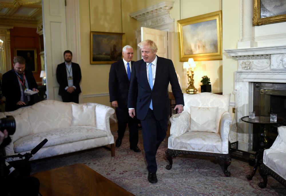 Britain's Prime Minister Boris Johnson, front, meets with US Vice President Mike Pence inside 10 Downing Street in London, Thursday, Sept. 5, 2019. (Peter Summers/Pool photos via AP) Britain's Prime Minister Boris Johnson, front, meets with US Vice President Mike Pence inside 10 Downing Street in London, Thursday, Sept. 5, 2019. (Peter Summers/Pool photos via AP)