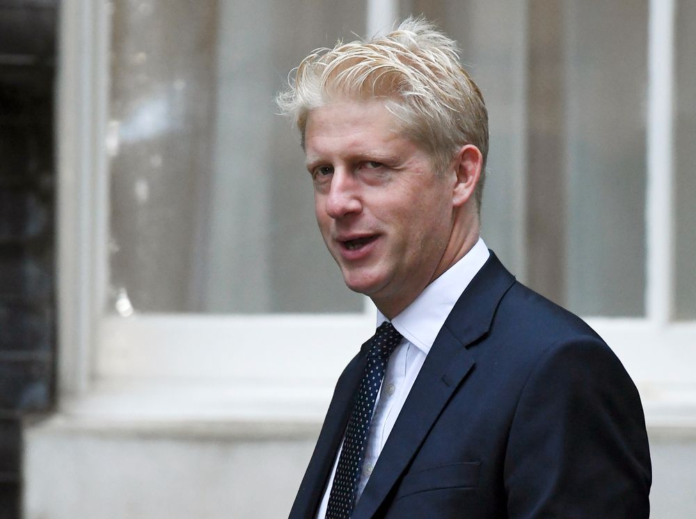 FILE - In this Wednesday, Sept. 4, 2019 file photo, Britain's Conservative Party lawmaker Jo Johnson arrives at Downing Street in London. Jo Johnson has announced he is quitting as an education minister and will step down from Parliament, saying he is “torn between family loyalty and the national interest.” (AP Photo/Alberto Pezzali, File) FILE - In this Wednesday, Sept. 4, 2019 file photo, Britain's Conservative Party lawmaker Jo Johnson arrives at Downing Street in London. Jo Johnson has announced he is quitting as an education minister and will step down from Parliament, saying he is “torn between family loyalty and the national interest.” (AP Photo/Alberto Pezzali, File)