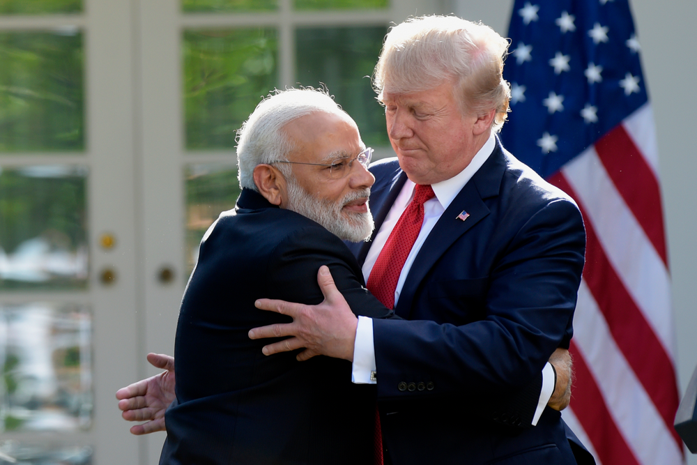 FILE - In this June 26, 2017 file photo, U.S. President Donald Trump and Indian Prime Minister Narendra Modi, left, hug while making statements in the Rose Garden of the White House in Washington. Indian Prime Minister Narendra Modi's party claimed it had won re-election with a commanding lead in vote count Thursday, May 23, 2019. Like President Donald Trump, to whom he is often compared, Modi is a big fan of Twitter and uses a YouTube channel to bypass traditional media. (AP Photo/Susan Walsh, File) FILE - In this June 26, 2017 file photo, U.S. President Donald Trump and Indian Prime Minister Narendra Modi, left, hug while making statements in the Rose Garden of the White House in Washington. Indian Prime Minister Narendra Modi's party claimed it had won re-election with a commanding lead in vote count Thursday, May 23, 2019. Like President Donald Trump, to whom he is often compared, Modi is a big fan of Twitter and uses a YouTube channel to bypass traditional media. (AP Photo/Susan Walsh, File)