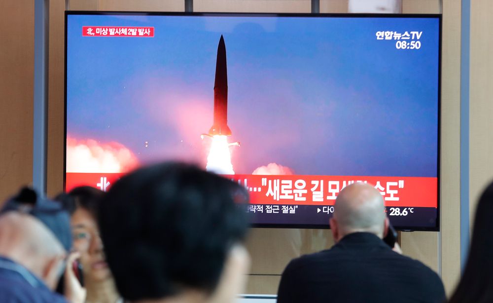 People watch a TV showing a file image of a North Korea's missile launch during a news program at the Seoul Railway Station in Seoul, South Korea, Tuesday, Aug. 6, 2019. North Korea on Tuesday continued to ramp up its weapons demonstrations by firing unidentified projectiles twice into the sea while lashing out at the United States and South Korea for continuing their joint military exercises that the North says could derail fragile nuclear diplomacy. The sign reads People watch a TV showing a file image of a North Korea's missile launch during a news program at the Seoul Railway Station in Seoul, South Korea, Tuesday, Aug. 6, 2019. North Korea on Tuesday continued to ramp up its weapons demonstrations by firing unidentified projectiles twice into the sea while lashing out at the United States and South Korea for continuing their joint military exercises that the North says could derail fragile nuclear diplomacy. The sign reads