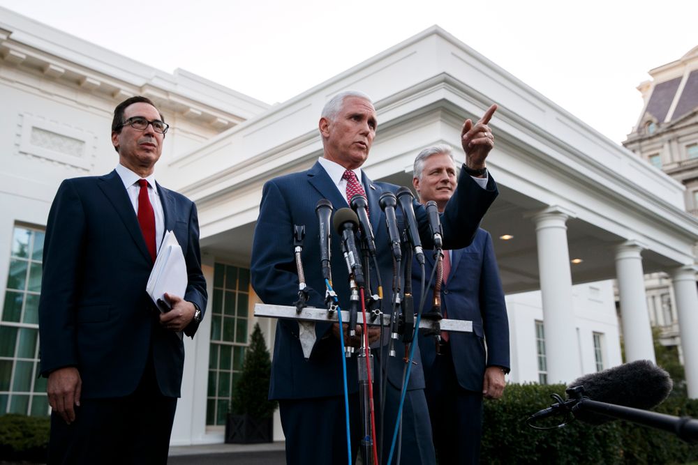 Vice President Mike Pence, with Treasury Secretary Steven Mnuchin, left, and national security adviser Robert O'Brien, speaks to reporters outside the West Wing of the White House, Monday, Oct. 14, 2019, in Washington. The U.S. is calling for an immediate ceasefire in Turkey's strikes against Kurds in Syria, and is sending Pence to lead mediation effort (AP Photo/Jacquelyn Martin) Vice President Mike Pence, with Treasury Secretary Steven Mnuchin, left, and national security adviser Robert O'Brien, speaks to reporters outside the West Wing of the White House, Monday, Oct. 14, 2019, in Washington. The U.S. is calling for an immediate ceasefire in Turkey's strikes against Kurds in Syria, and is sending Pence to lead mediation effort (AP Photo/Jacquelyn Martin)