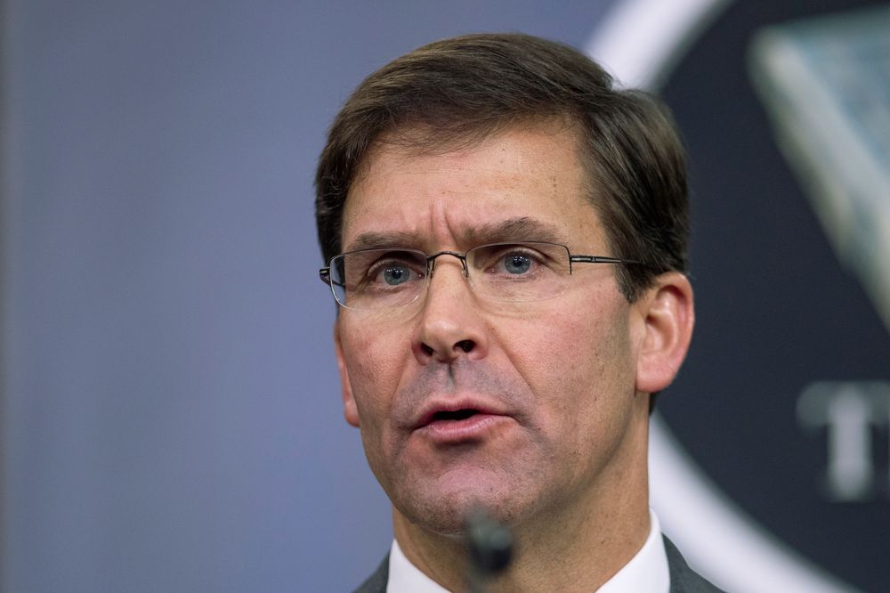 FILE - In this Aug. 28, 2019, file photo, Secretary of Defense Mark Esper speaks to reporters during a briefing at the Pentagon. Esper says the FILE - In this Aug. 28, 2019, file photo, Secretary of Defense Mark Esper speaks to reporters during a briefing at the Pentagon. Esper says the