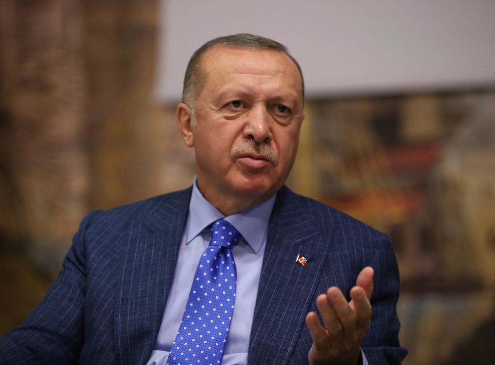 Turkey's President Recep Tayyip Erdogan speaks to Turkish journalists, in Istanbul, Sunday, Oct. 13, 2019. Erdogan has rejected offers for mediation with Syrian Kurdish fighters as the Turkish military continues its offensive against them in northern Syria. (Presidential Press Service via AP, Pool) Turkey's President Recep Tayyip Erdogan speaks to Turkish journalists, in Istanbul, Sunday, Oct. 13, 2019. Erdogan has rejected offers for mediation with Syrian Kurdish fighters as the Turkish military continues its offensive against them in northern Syria. (Presidential Press Service via AP, Pool)