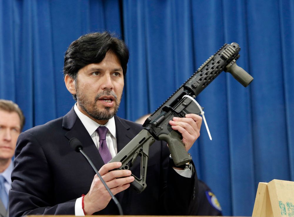 FILE - In this Jan. 13, 2014 file photo, former California State Sen. Kevin de Leon, D-Los Angeles, displays a homemade fully automatic rifle, confiscated by the Department of Justice, at the Capitol in Sacramento, Calif. California is among a handful of states taking tough actions to limit the availability of guns including military-style assault weapons, restrict the capacity of ammunition magazines and require background checks for purchasing bullets. But those steps and future gun control laws passed by Democratic-leaning states could face an uphill battle as the federal court system becomes increasingly dominated by conservative Republican appointees.(AP Photo/Rich Pedroncelli, File) FILE - In this Jan. 13, 2014 file photo, former California State Sen. Kevin de Leon, D-Los Angeles, displays a homemade fully automatic rifle, confiscated by the Department of Justice, at the Capitol in Sacramento, Calif. California is among a handful of states taking tough actions to limit the availability of guns including military-style assault weapons, restrict the capacity of ammunition magazines and require background checks for purchasing bullets. But those steps and future gun control laws passed by Democratic-leaning states could face an uphill battle as the federal court system becomes increasingly dominated by conservative Republican appointees.(AP Photo/Rich Pedroncelli, File)