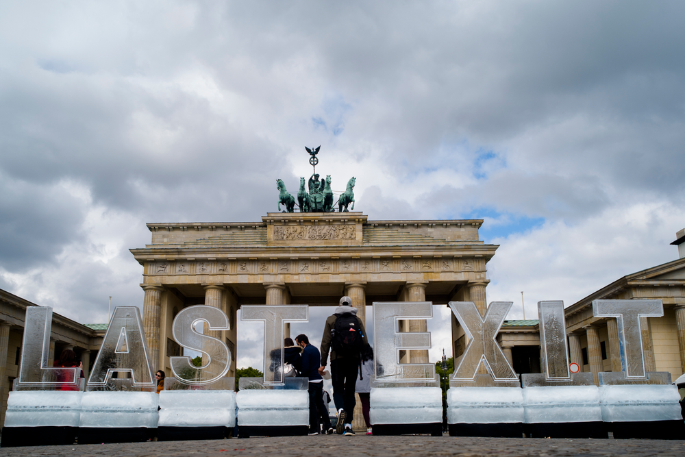 Climate activists of the Greenpeace organisation protest with big ice blocks reading 'Last Exit' in front of the Brandenburg Gate in Berlin, Tuesday, May 14, 2019. The protest is in reference to the Petersberg climate talks. (AP Photo/Markus Schreiber) Climate activists of the Greenpeace organisation protest with big ice blocks reading 'Last Exit' in front of the Brandenburg Gate in Berlin, Tuesday, May 14, 2019. The protest is in reference to the Petersberg climate talks. (AP Photo/Markus Schreiber)