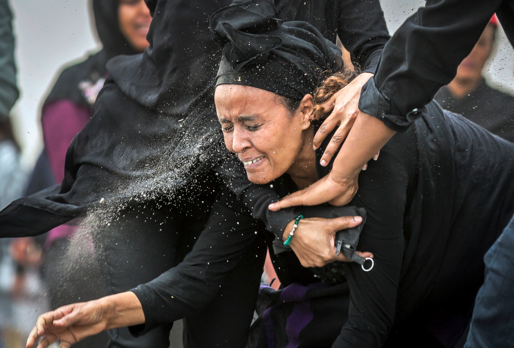 An Ethiopian relative of a crash victim throws dirt in her own face after realising that there is nothing physical left of her loved one, as she mourns at the scene where the Ethiopian Airlines Boeing 737 Max 8 crashed shortly after takeoff on Sunday killing all 157 on board, near Bishoftu, south-east of Addis Ababa, in Ethiopia Thursday, March 14, 2019. About 200 family members of people who died on the crashed jet stormed out of a briefing with Ethiopian Airlines officials in Addis Ababa on Thursday, complaining that the airline has not given them adequate information. (AP Photo/Mulugeta Ayene) An Ethiopian relative of a crash victim throws dirt in her own face after realising that there is nothing physical left of her loved one, as she mourns at the scene where the Ethiopian Airlines Boeing 737 Max 8 crashed shortly after takeoff on Sunday killing all 157 on board, near Bishoftu, south-east of Addis Ababa, in Ethiopia Thursday, March 14, 2019. About 200 family members of people who died on the crashed jet stormed out of a briefing with Ethiopian Airlines officials in Addis Ababa on Thursday, complaining that the airline has not given them adequate information. (AP Photo/Mulugeta Ayene)