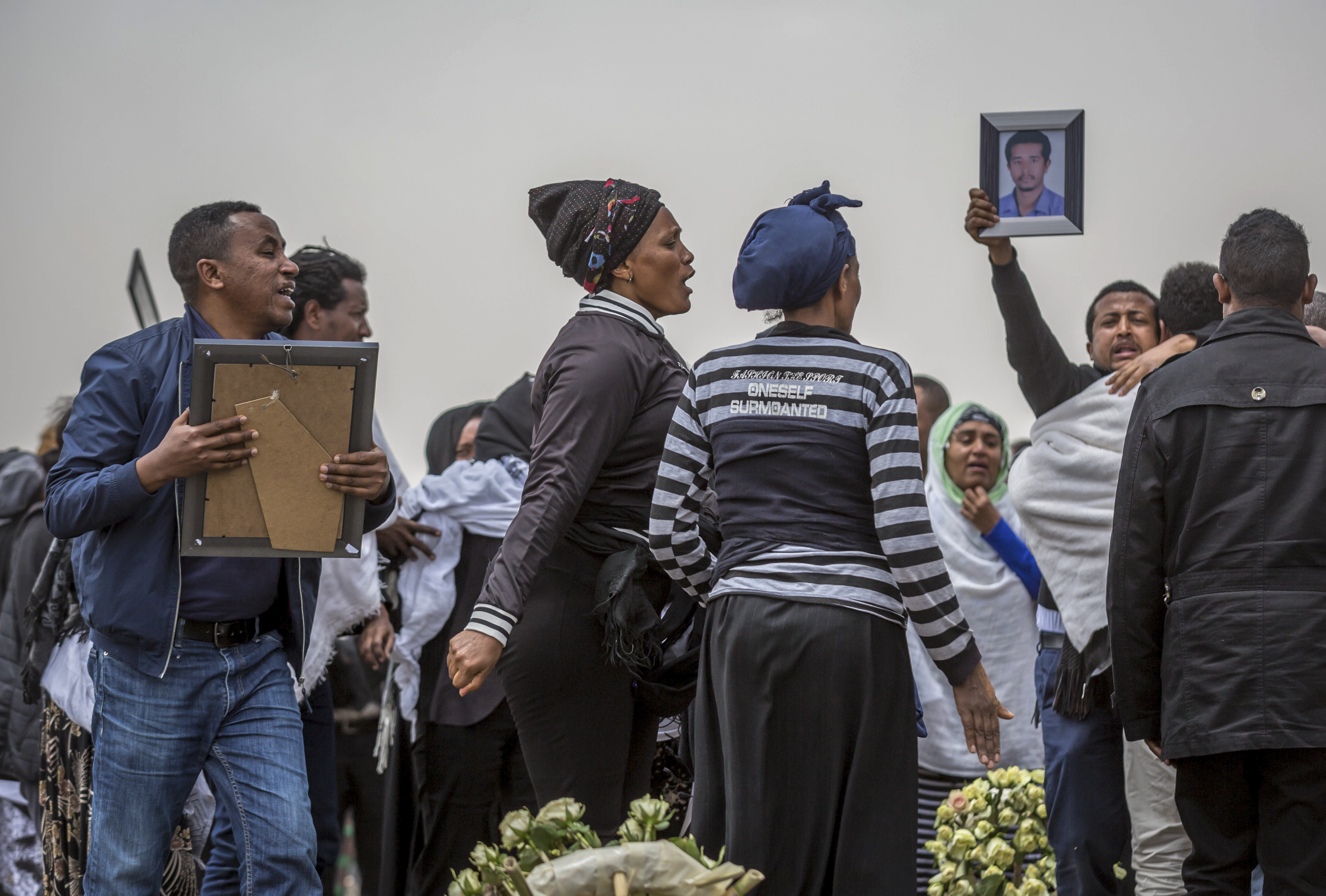 Ethiopian relatives of crash victims mourn at the scene where the Ethiopian Airlines Boeing 737 Max 8 crashed shortly after takeoff on Sunday killing all 157 on board, near Bishoftu, south-east of Addis Ababa, in Ethiopia Thursday, March 14, 2019. About 200 family members of people who died on the crashed jet stormed out of a briefing with Ethiopian Airlines officials in Addis Ababa on Thursday, complaining that the airline has not given them adequate information. (AP Photo/Mulugeta Ayene) Ethiopian relatives of crash victims mourn at the scene where the Ethiopian Airlines Boeing 737 Max 8 crashed shortly after takeoff on Sunday killing all 157 on board, near Bishoftu, south-east of Addis Ababa, in Ethiopia Thursday, March 14, 2019. About 200 family members of people who died on the crashed jet stormed out of a briefing with Ethiopian Airlines officials in Addis Ababa on Thursday, complaining that the airline has not given them adequate information. (AP Photo/Mulugeta Ayene)