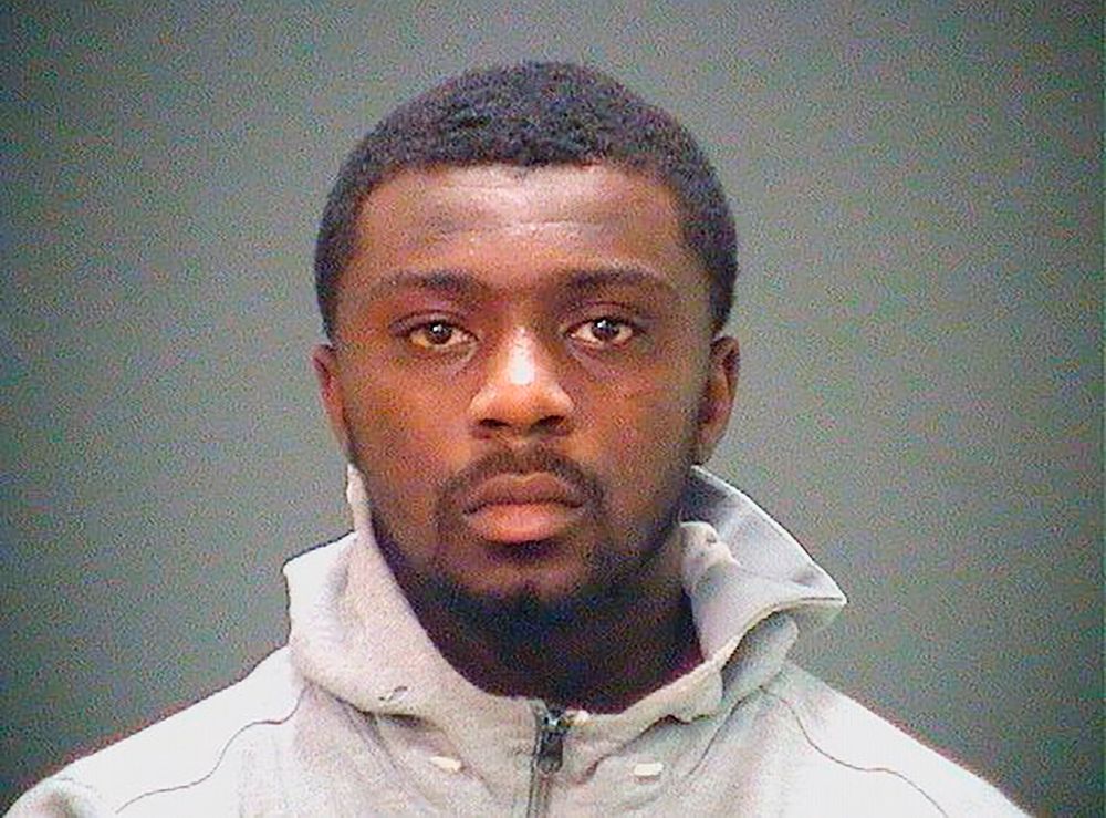 In this booking photo provided by the Cuyahoga County Sheriff's Office shows Frank Q. Jackson, a grandson of Cleveland Mayor Frank Jackson. Frank Q. Jackson has been taken into custody in an assault case after an Ohio mayor negotiated his surrender to the U.S. Marshal's Office. He was granted bond and was placed under house arrest with electronic GPS monitoring. A woman who says her son was killed by gang members connected to Frank Q. Jackson has filed a wrongful death lawsuit saying that the mayor and a police chief interfered in an investigation of the slaying. (Cuyahoga County Sheriff's Office via AP) In this booking photo provided by the Cuyahoga County Sheriff's Office shows Frank Q. Jackson, a grandson of Cleveland Mayor Frank Jackson. Frank Q. Jackson has been taken into custody in an assault case after an Ohio mayor negotiated his surrender to the U.S. Marshal's Office. He was granted bond and was placed under house arrest with electronic GPS monitoring. A woman who says her son was killed by gang members connected to Frank Q. Jackson has filed a wrongful death lawsuit saying that the mayor and a police chief interfered in an investigation of the slaying. (Cuyahoga County Sheriff's Office via AP)