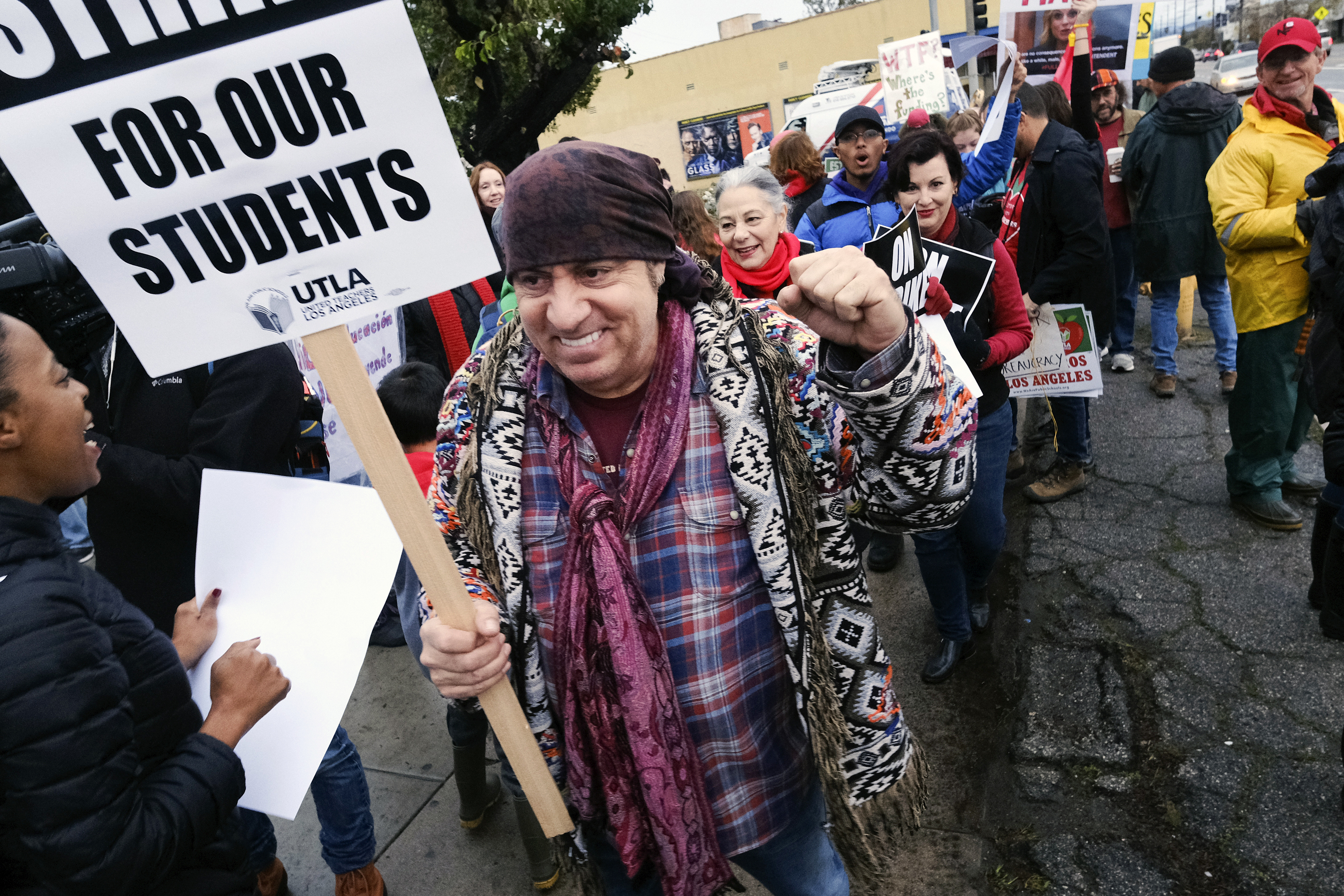 Actor, musician and activist, Steven Van Zandt supports striking teachers on the picket in front of Hamilton High School in Los Angeles on Wednesday, Jan. 16, 2019. School administrators urged the union to resume bargaining as tens of thousands of teachers planned to walk picket lines for a third day Wednesday. (AP Photo/Richard Vogel) Actor, musician and activist, Steven Van Zandt supports striking teachers on the picket in front of Hamilton High School in Los Angeles on Wednesday, Jan. 16, 2019. School administrators urged the union to resume bargaining as tens of thousands of teachers planned to walk picket lines for a third day Wednesday. (AP Photo/Richard Vogel)
