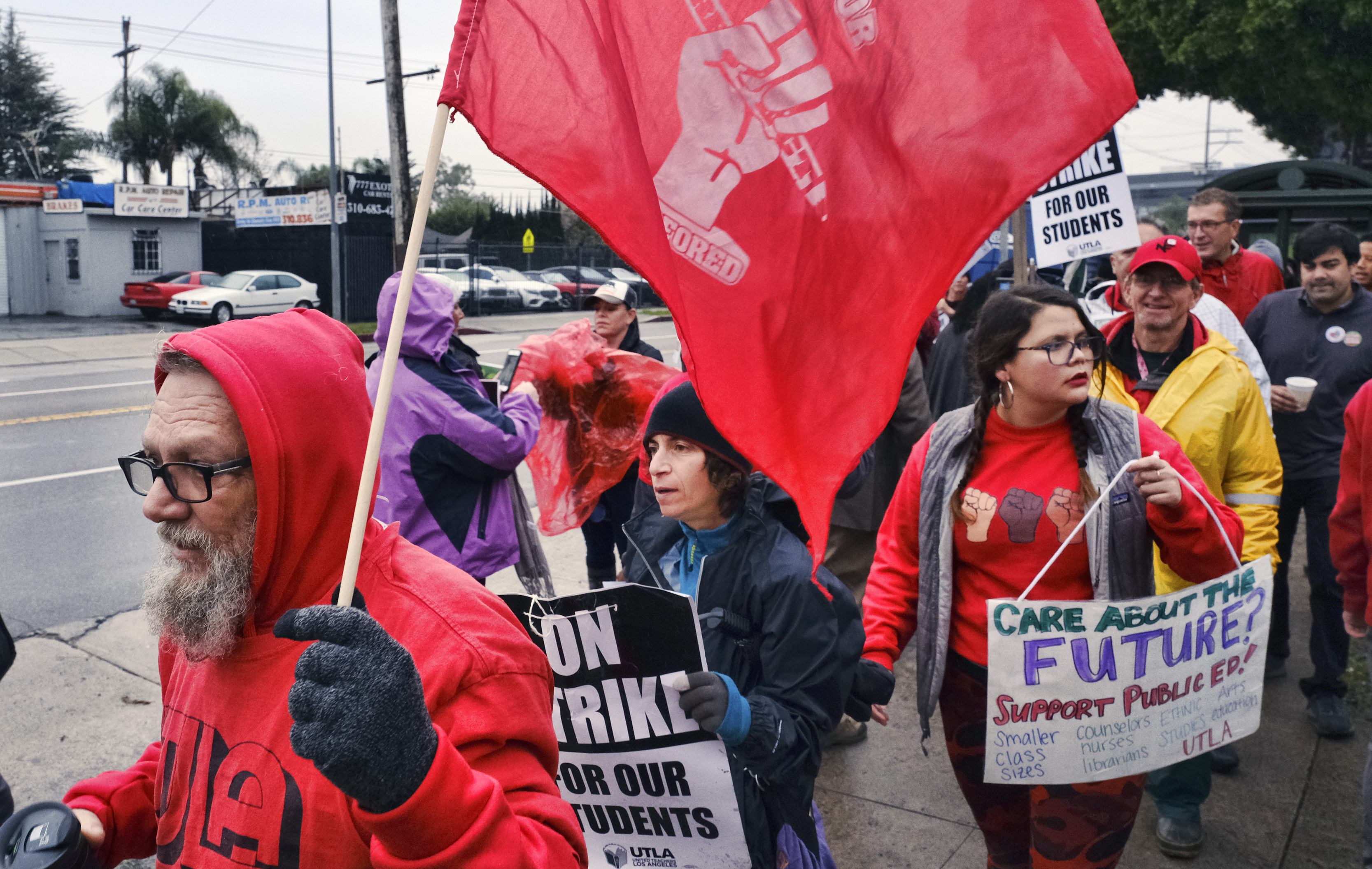 Spanish teacher at Hamilton High School, Jose Ramos, left, joins teachers during a strike in front of Hamilton High School in Los Angeles on Wednesday, Jan. 16, 2019. Los Angeles school administrators urged the union to resume bargaining as tens of thousands of teachers planned to walk picket lines for a third day Wednesday, after being joined on strike for the first time by some of their counterparts from independent charter schools. (AP Photo/Richard Vogel) Spanish teacher at Hamilton High School, Jose Ramos, left, joins teachers during a strike in front of Hamilton High School in Los Angeles on Wednesday, Jan. 16, 2019. Los Angeles school administrators urged the union to resume bargaining as tens of thousands of teachers planned to walk picket lines for a third day Wednesday, after being joined on strike for the first time by some of their counterparts from independent charter schools. (AP Photo/Richard Vogel)