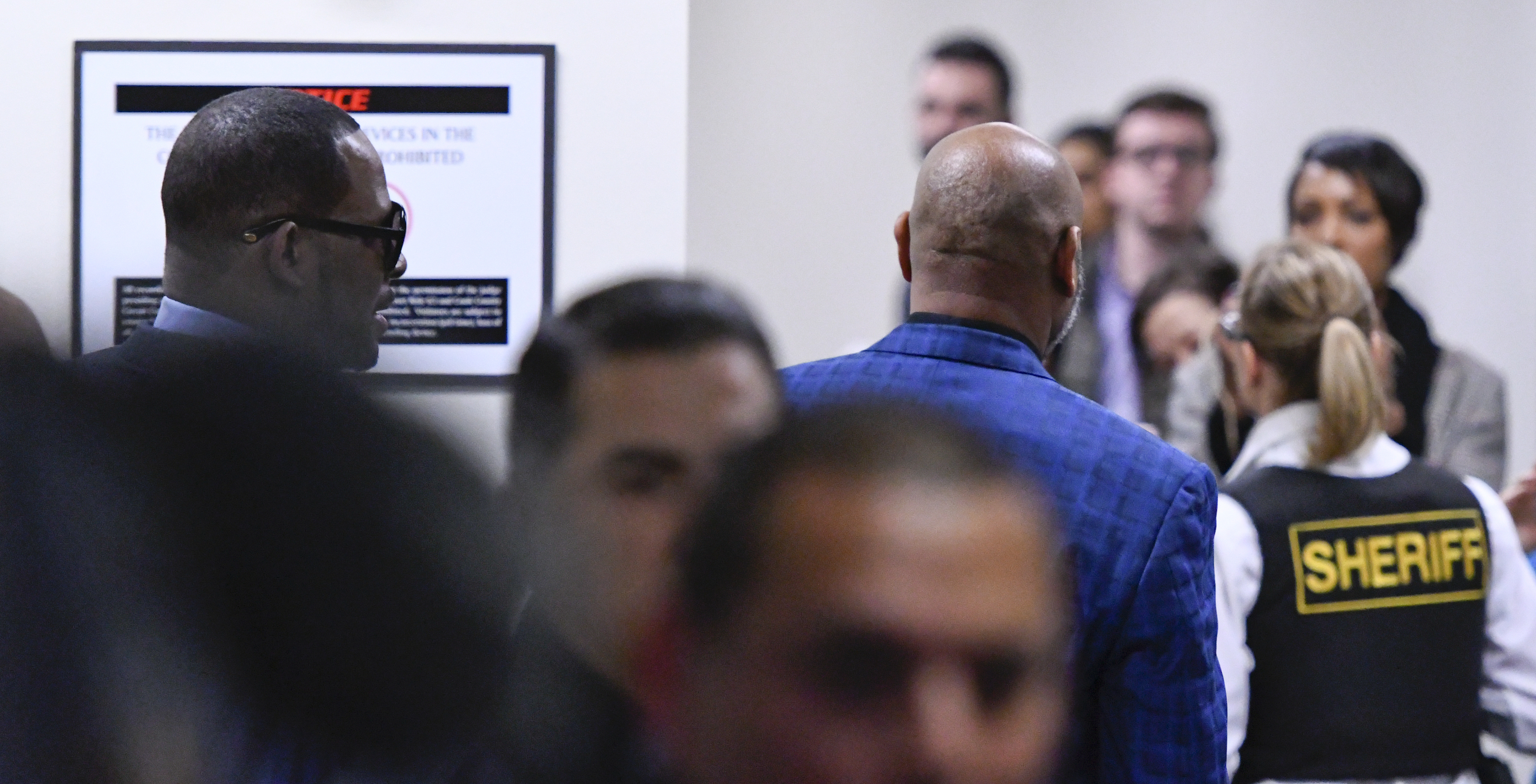 Musician R. Kelly, left, heads into court after he arrived at the Daley Center for a hearing in his child support case in which he allegedly owes $161,663 to his ex-wife, at the Daley Center, Wednesday, March 6, 2019, in Chicago. (AP Photo/Matt Marton) Musician R. Kelly, left, heads into court after he arrived at the Daley Center for a hearing in his child support case in which he allegedly owes $161,663 to his ex-wife, at the Daley Center, Wednesday, March 6, 2019, in Chicago. (AP Photo/Matt Marton)