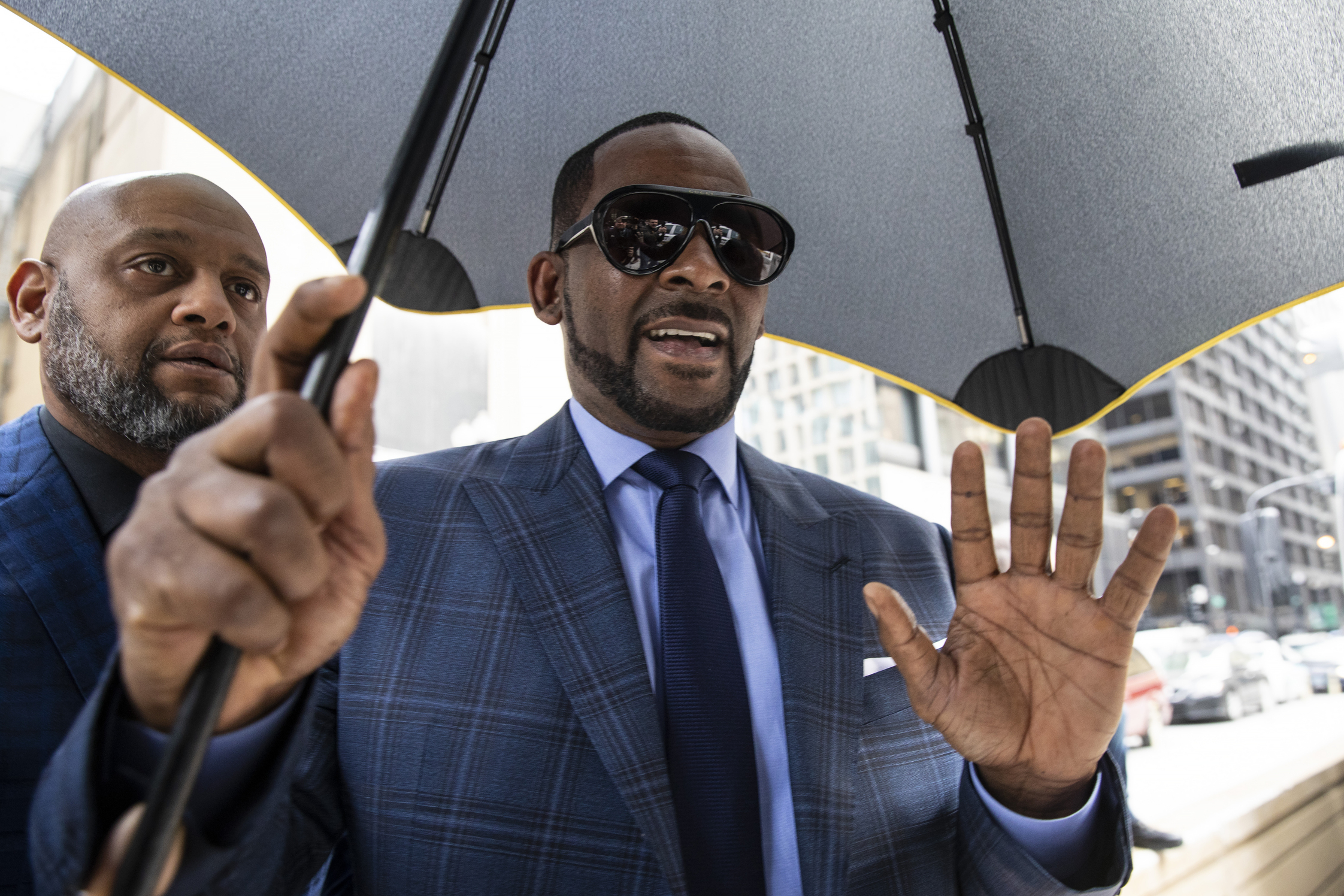Musician R. Kelly arrives at the Daley Center for a hearing in his child support case at the Daley Center, Wednesday, March 6, 2019, in Chicago. Kelly was charged last month with sexually abusing four females dating back to 1998, including three underage girls. He's pleaded not guilty. (Ashlee Rezin/Chicago Sun-Times via AP) Musician R. Kelly arrives at the Daley Center for a hearing in his child support case at the Daley Center, Wednesday, March 6, 2019, in Chicago. Kelly was charged last month with sexually abusing four females dating back to 1998, including three underage girls. He's pleaded not guilty. (Ashlee Rezin/Chicago Sun-Times via AP)