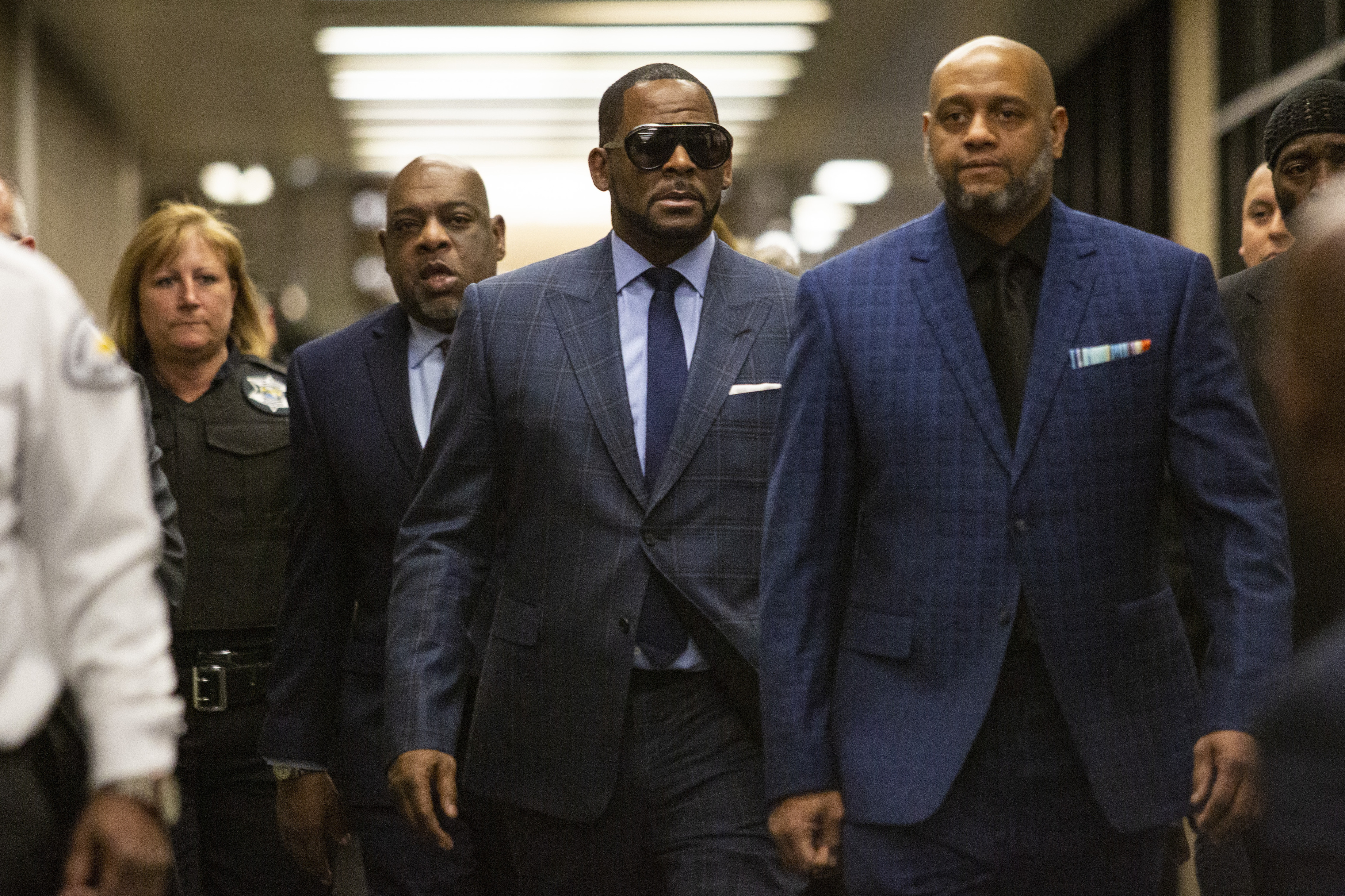 Musician R. Kelly arrives at the Daley Center for a hearing in his child support case at the Daley Center, Wednesday, March 6, 2019, in Chicago. Kelly was charged last month with sexually abusing four females dating back to 1998, including three underage girls. He's pleaded not guilty. (Ashlee Rezin/Chicago Sun-Times via AP) Musician R. Kelly arrives at the Daley Center for a hearing in his child support case at the Daley Center, Wednesday, March 6, 2019, in Chicago. Kelly was charged last month with sexually abusing four females dating back to 1998, including three underage girls. He's pleaded not guilty. (Ashlee Rezin/Chicago Sun-Times via AP)