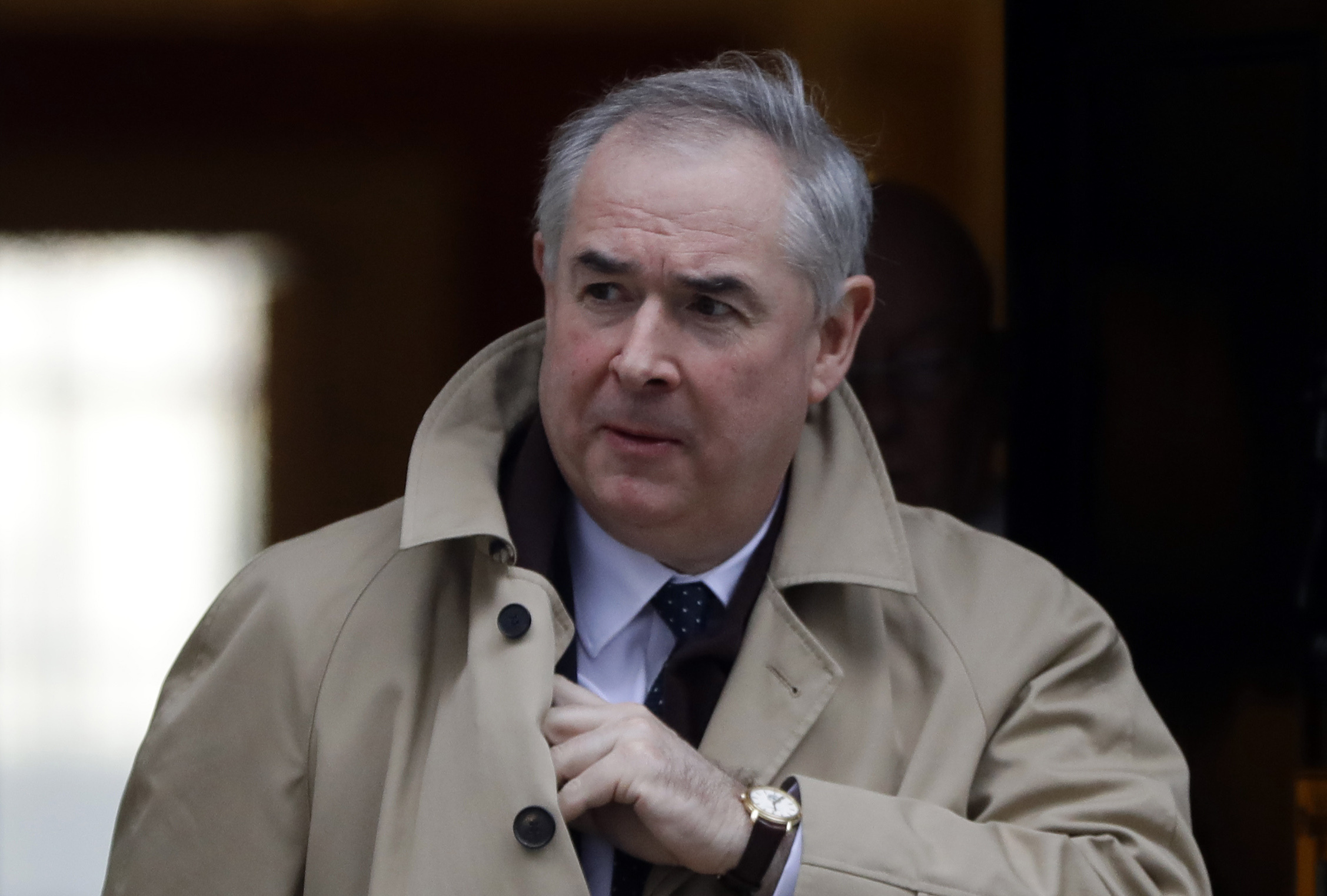 FILE - In this Tuesday, Jan. 29, 2019 file photo, Attorney General Geoffrey Cox leaves after a cabinet meeting at Downing Street in London. Britain's chief law officer says Brexit negotiations with the European Union will continue through the weekend, as the U.K. scrambles to secure changes to the EU divorce deal before a vote in Parliament next week, it was reported on Thursday, March 7, 2019. The EU says FILE - In this Tuesday, Jan. 29, 2019 file photo, Attorney General Geoffrey Cox leaves after a cabinet meeting at Downing Street in London. Britain's chief law officer says Brexit negotiations with the European Union will continue through the weekend, as the U.K. scrambles to secure changes to the EU divorce deal before a vote in Parliament next week, it was reported on Thursday, March 7, 2019. The EU says