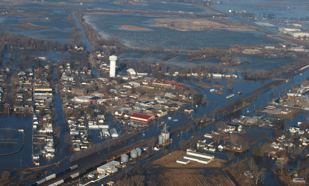 CORRECTS MONTH TO MARCH NOT MAY - The city of Valley is inundated with floodwaters Sunday, March 17, 2019, in Valley, Neb. Hundreds of people were evacuated from their homes in Nebraska and Iowa as levees succumbed to the rush of water. (Jeff Bundy/Omaha World-Herald via AP) CORRECTS MONTH TO MARCH NOT MAY - The city of Valley is inundated with floodwaters Sunday, March 17, 2019, in Valley, Neb. Hundreds of people were evacuated from their homes in Nebraska and Iowa as levees succumbed to the rush of water. (Jeff Bundy/Omaha World-Herald via AP)
