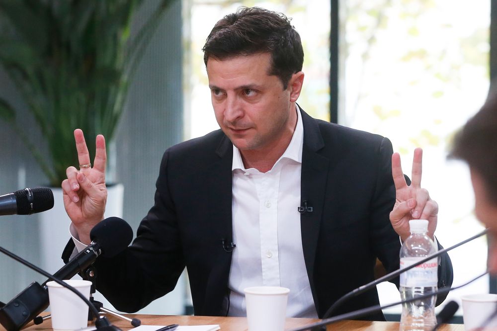 Ukrainian President Volodymyr Zelenskiy speaks during talks with journalists in Kyiv, Ukraine, Thursday, Oct. 10, 2019. Ukrainian President is holding an all-day “media marathon” in a Kyiv food court amid growing questions about his actions as president. (AP Photo/Efrem Lukatsky) Ukrainian President Volodymyr Zelenskiy speaks during talks with journalists in Kyiv, Ukraine, Thursday, Oct. 10, 2019. Ukrainian President is holding an all-day “media marathon” in a Kyiv food court amid growing questions about his actions as president. (AP Photo/Efrem Lukatsky)