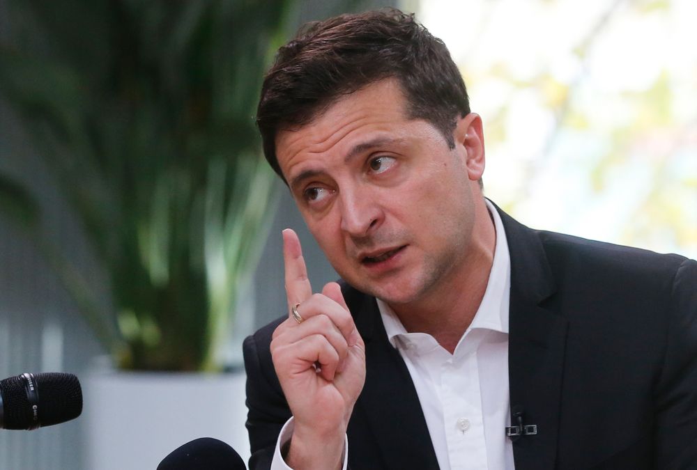 Ukrainian President Volodymyr Zelenskiy speaks during talks with journalists in Kyiv, Ukraine, Thursday, Oct. 10, 2019. Ukrainian President is holding an all-day “media marathon” in a Kyiv food court amid growing questions about his actions as president. (AP Photo/Efrem Lukatsky) Ukrainian President Volodymyr Zelenskiy speaks during talks with journalists in Kyiv, Ukraine, Thursday, Oct. 10, 2019. Ukrainian President is holding an all-day “media marathon” in a Kyiv food court amid growing questions about his actions as president. (AP Photo/Efrem Lukatsky)