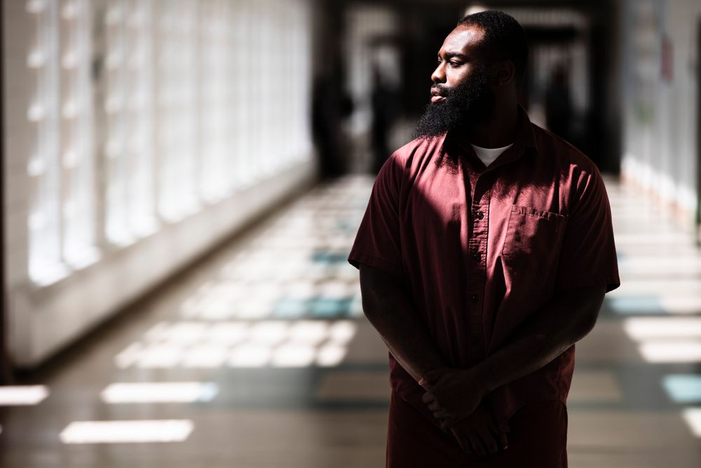 In this Thursday, Aug. 29, 2019 photo, incarcerated filmmaker Robert poses for a portrait at the State Correctional Institution in Chester, Pa. Eastern State Penitentiary, a former prison that's now a museum in Philadelphia is showcasing the work of currently incarcerated filmmakers, projecting the animated shorts onto its outside walls. The new exhibit titled “Hidden Lives Illuminated” offers a glimpse into the lives of these inmates to passersby and museum visitors alike. (AP Photo/Matt Rourke) In this Thursday, Aug. 29, 2019 photo, incarcerated filmmaker Robert poses for a portrait at the State Correctional Institution in Chester, Pa. Eastern State Penitentiary, a former prison that's now a museum in Philadelphia is showcasing the work of currently incarcerated filmmakers, projecting the animated shorts onto its outside walls. The new exhibit titled “Hidden Lives Illuminated” offers a glimpse into the lives of these inmates to passersby and museum visitors alike. (AP Photo/Matt Rourke)