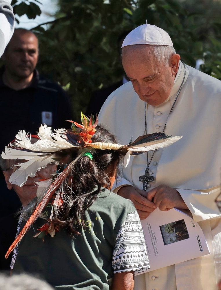 Pope Francis meets members of indigenous populations on the occasion of the feast of St. Francis of Assisi, the patron saint of ecology, at the Vatican, Friday, Oct. 4, 2019. The ceremony takes place two days before a Synod of bishops on the Pan-Amazon region opens at the Vatican to address the ecological, social and spiritual needs of indigenous peoples in the Amazon. (AP Photo/Alessandra Tarantino) Pope Francis meets members of indigenous populations on the occasion of the feast of St. Francis of Assisi, the patron saint of ecology, at the Vatican, Friday, Oct. 4, 2019. The ceremony takes place two days before a Synod of bishops on the Pan-Amazon region opens at the Vatican to address the ecological, social and spiritual needs of indigenous peoples in the Amazon. (AP Photo/Alessandra Tarantino)