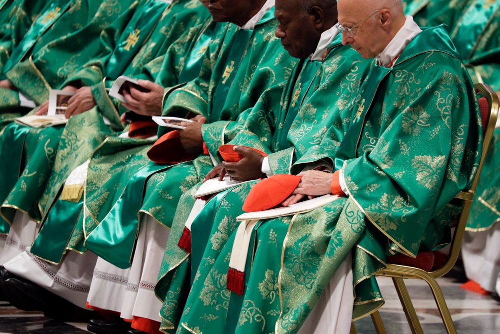 Prelates wear green vestments as they attend an opening Mass for the Amazon synod, in St. Peter's Basilica, at the Vatican, Sunday, Oct. 6, 2019. Francis celebrated an opening Mass in St. Peter's Basilica with global attention newly focused on the forest fires that are devouring the rainforest, which scientists say is a crucial bulwark against global warming. On hand for the service were indigenous peoples, some with their faces painted and wearing feathered headdresses, as well as more than 180 South American cardinals, bishops and priests, who donned green vestments like the pope. (AP Photo/Andrew Medichini) Prelates wear green vestments as they attend an opening Mass for the Amazon synod, in St. Peter's Basilica, at the Vatican, Sunday, Oct. 6, 2019. Francis celebrated an opening Mass in St. Peter's Basilica with global attention newly focused on the forest fires that are devouring the rainforest, which scientists say is a crucial bulwark against global warming. On hand for the service were indigenous peoples, some with their faces painted and wearing feathered headdresses, as well as more than 180 South American cardinals, bishops and priests, who donned green vestments like the pope. (AP Photo/Andrew Medichini)