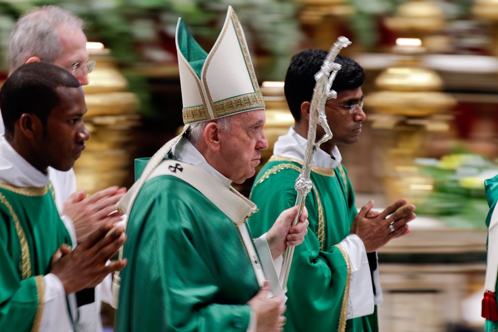 Pope Francis leaves after celebrating an opening Mass for the Amazon synod, in St. Peter's Basilica, at the Vatican, Sunday, Oct. 6, 2019. Pope Francis urged bishops on Sunday to boldly shake up the status quo as they chart ways to better care for the Amazon and its indigenous peoples, amid threats from forest fires, development and what he called ideological Pope Francis leaves after celebrating an opening Mass for the Amazon synod, in St. Peter's Basilica, at the Vatican, Sunday, Oct. 6, 2019. Pope Francis urged bishops on Sunday to boldly shake up the status quo as they chart ways to better care for the Amazon and its indigenous peoples, amid threats from forest fires, development and what he called ideological