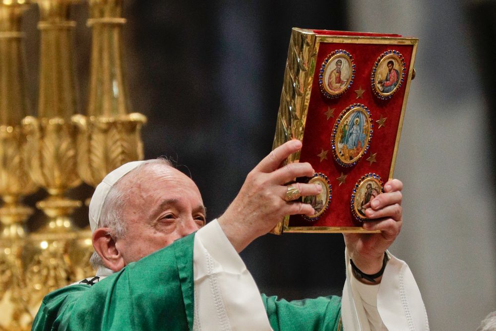 Pope Francis holds up the book of Gospels celebrates an opening Mass for the Amazon synod, in St. Peter's Basilica, at the Vatican, Sunday, Oct. 6, 2019. Pope Francis is opening a divisive meeting on preserving the Amazon and ministering to its indigenous peoples, as he fends off attacks from conservatives who are opposed to his ecological agenda. (AP Photo/Andrew Medichini) Pope Francis holds up the book of Gospels celebrates an opening Mass for the Amazon synod, in St. Peter's Basilica, at the Vatican, Sunday, Oct. 6, 2019. Pope Francis is opening a divisive meeting on preserving the Amazon and ministering to its indigenous peoples, as he fends off attacks from conservatives who are opposed to his ecological agenda. (AP Photo/Andrew Medichini)