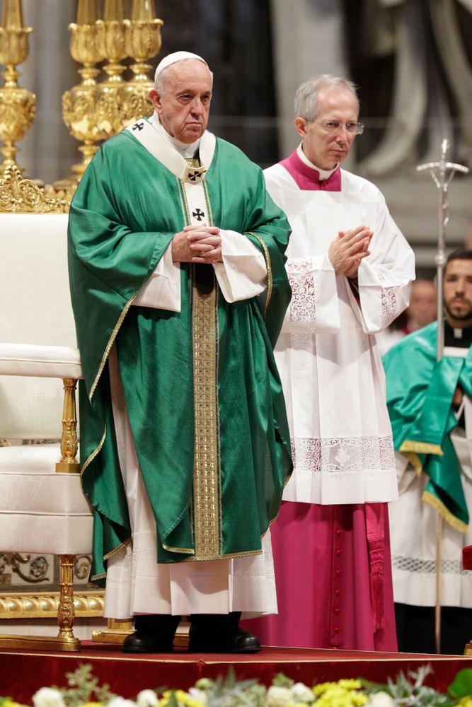 Pope Francis is flanked by Mons. Guido Marini, the Vatican master of liturgical ceremonies, as he celebrates an opening Mass for the Amazon synod, in St. Peter's Basilica, at the Vatican, Sunday, Oct. 6, 2019. Pope Francis is opening a divisive meeting on preserving the Amazon and ministering to its indigenous peoples, as he fends off attacks from conservatives who are opposed to his ecological agenda. (AP Photo/Andrew Medichini) Pope Francis is flanked by Mons. Guido Marini, the Vatican master of liturgical ceremonies, as he celebrates an opening Mass for the Amazon synod, in St. Peter's Basilica, at the Vatican, Sunday, Oct. 6, 2019. Pope Francis is opening a divisive meeting on preserving the Amazon and ministering to its indigenous peoples, as he fends off attacks from conservatives who are opposed to his ecological agenda. (AP Photo/Andrew Medichini)