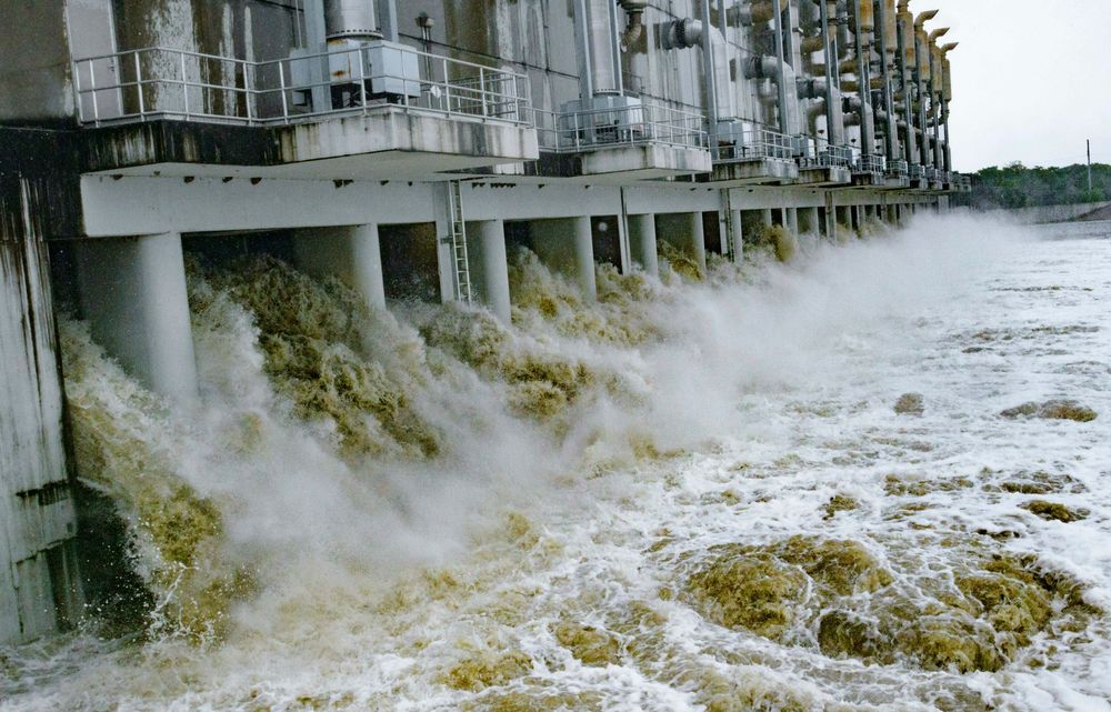 This photo shows the Gulf Intracoastal Waterway West Closure Complex, Saturday, July 13, 2019 in Belle Chasse, La. It is the largest pumping station in the world and as is part of the Southeast Louisiana Flood Protection Authority-West and the West Jefferson (Parish) and Algiers Levee District serving the residents of West Bank of the Greater New Orleans. The 11 pumps are being started because of anticipated rain from Hurricane Barry. The 11 pumps at full capacity pump 8.6 million gallons per minute, which would fill up the Superdome in 110 minutes and would fill an Olympic-size swimming in 3.5 seconds. (AP Photo/Matthew Hinton) This photo shows the Gulf Intracoastal Waterway West Closure Complex, Saturday, July 13, 2019 in Belle Chasse, La. It is the largest pumping station in the world and as is part of the Southeast Louisiana Flood Protection Authority-West and the West Jefferson (Parish) and Algiers Levee District serving the residents of West Bank of the Greater New Orleans. The 11 pumps are being started because of anticipated rain from Hurricane Barry. The 11 pumps at full capacity pump 8.6 million gallons per minute, which would fill up the Superdome in 110 minutes and would fill an Olympic-size swimming in 3.5 seconds. (AP Photo/Matthew Hinton)