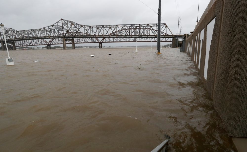As the Atchafalaya River continues to rise due to the rains of Tropical Storm Barry, it becomes harder to see the Morgan City name on the sea wall, Saturday, July 13, 2019 in Morgan City, La. (AP Photo/Rogelio V. Solis) As the Atchafalaya River continues to rise due to the rains of Tropical Storm Barry, it becomes harder to see the Morgan City name on the sea wall, Saturday, July 13, 2019 in Morgan City, La. (AP Photo/Rogelio V. Solis)