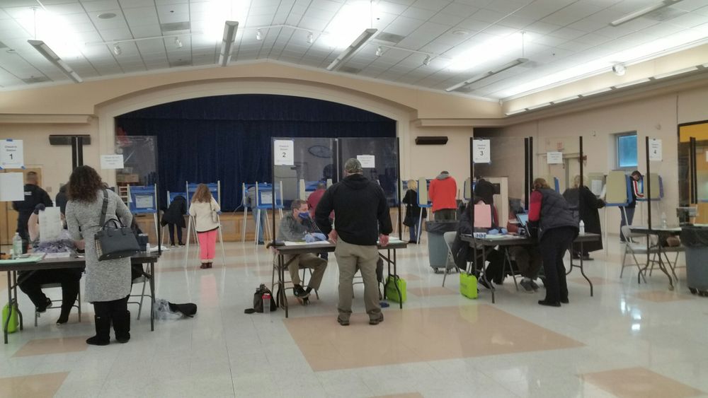 Voters cast ballots at Orchard Farms Elementary School in Cranston.