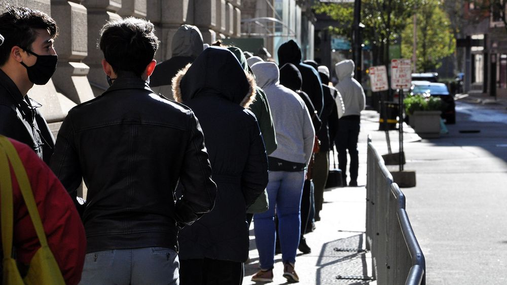 Voters line up outside Providence City Hall, November 2, 2020.