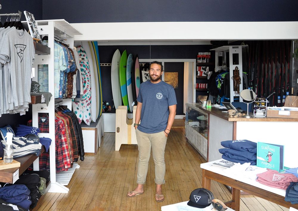 Walle Hutton, owner of Rhode Island Surf Co., at his shop in downtown Westerly.