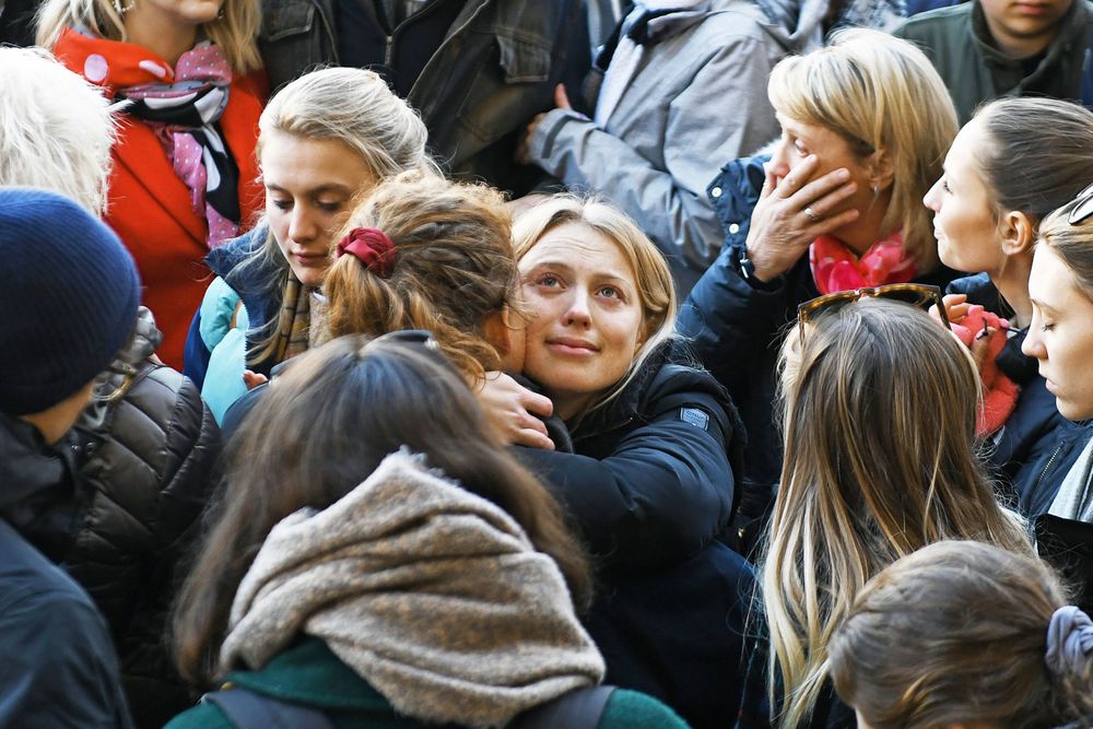 Leanne O'Brien, centre, the girlfriend of Jack Merritt, is comforted by family members during a vigil at The Guildhall to honour him and Saskia Jones who were both killed in Friday's attack on London Bridge, in Cambridge, England, Monday, Dec. 2, 2019. London Bridge reopened to cars and pedestrians Monday, three days after a man previously convicted of terrorism offenses stabbed two people to death and injured three others before being shot dead by police. (Joe Giddens/PA via AP) Leanne O'Brien, centre, the girlfriend of Jack Merritt, is comforted by family members during a vigil at The Guildhall to honour him and Saskia Jones who were both killed in Friday's attack on London Bridge, in Cambridge, England, Monday, Dec. 2, 2019. London Bridge reopened to cars and pedestrians Monday, three days after a man previously convicted of terrorism offenses stabbed two people to death and injured three others before being shot dead by police. (Joe Giddens/PA via AP)