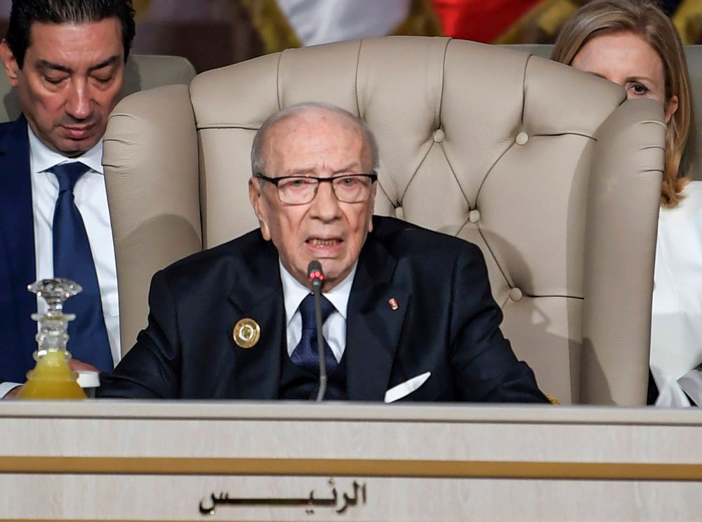 FILE - In this March 31, 2019, file photo, Tunisian President Beji Caid Essebsi chairs the opening session of the 30th Arab Summit in Tunis, Tunisia. Tunisian President Beji Caid Essebsi, the country's first democratically elected leader, has died at 92, his office announced Thursday July 25, 2019. (Fethi Belaid/ Pool Photo via AP, File) FILE - In this March 31, 2019, file photo, Tunisian President Beji Caid Essebsi chairs the opening session of the 30th Arab Summit in Tunis, Tunisia. Tunisian President Beji Caid Essebsi, the country's first democratically elected leader, has died at 92, his office announced Thursday July 25, 2019. (Fethi Belaid/ Pool Photo via AP, File)