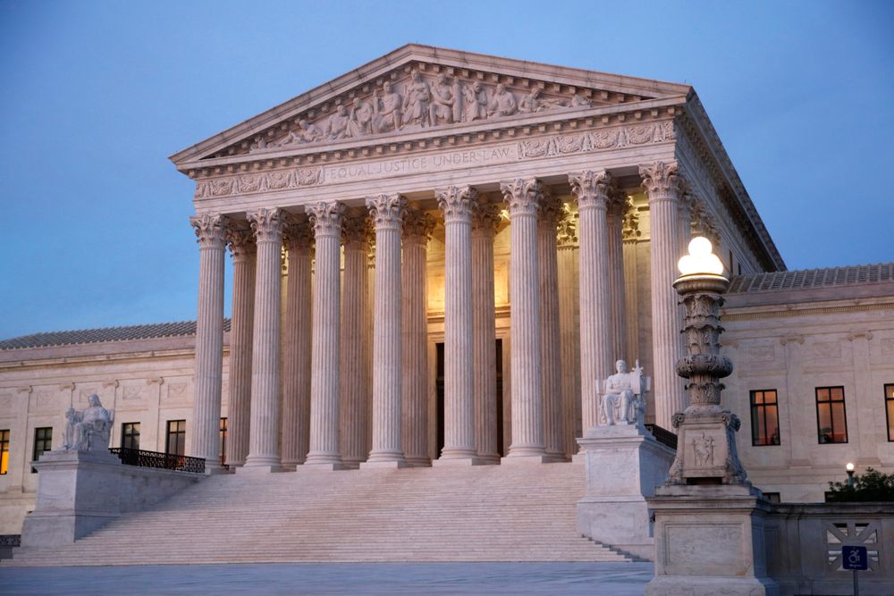 FILE - In this May 23, 2019 file photo, the U.S. Supreme Court building at dusk on Capitol Hill in Washington. Oregon's attorney general is telling the U.S. Supreme Court that Oregon's criminal justice system would be FILE - In this May 23, 2019 file photo, the U.S. Supreme Court building at dusk on Capitol Hill in Washington. Oregon's attorney general is telling the U.S. Supreme Court that Oregon's criminal justice system would be