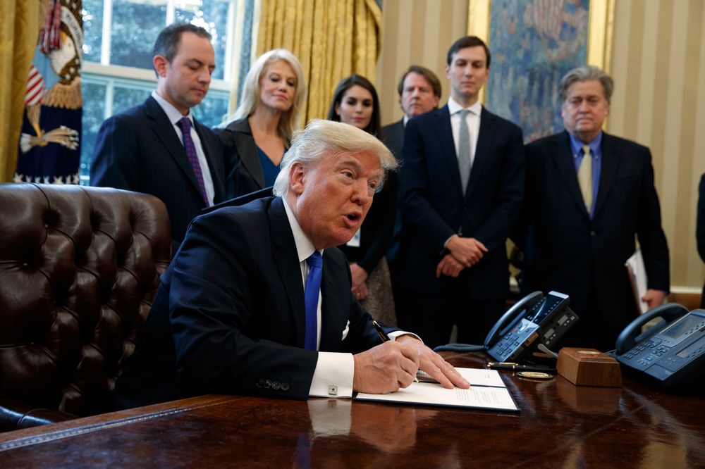 FILE - In this Jan. 24, 2017, file photo, President Donald Trump signs an executive order on the Keystone XL pipeline in the Oval Office of the White House. Native American tribes in Montana and South Dakota say the Trump administration unlawfully approved the oil pipeline without considering potential damage to cultural sites. (AP Photo/Evan Vucci, File) FILE - In this Jan. 24, 2017, file photo, President Donald Trump signs an executive order on the Keystone XL pipeline in the Oval Office of the White House. Native American tribes in Montana and South Dakota say the Trump administration unlawfully approved the oil pipeline without considering potential damage to cultural sites. (AP Photo/Evan Vucci, File)