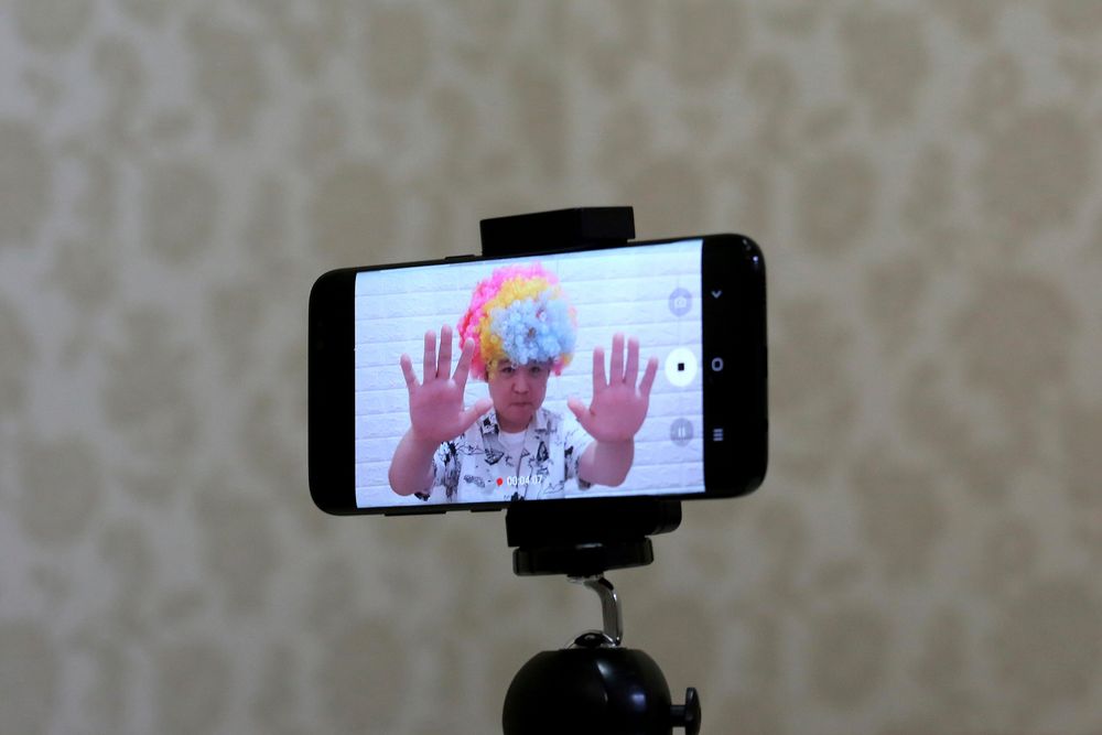 In this July 18, 2019, photo, a smartphone screen shows North Korean refugee Jang Myung-jin as he films himself in a demonstration of his YouTube broadcast during an interview at his house in Seoul, South Korea. The 32-year-old Jang is among a handful of young North Korean refugees in South Korea who have launched YouTube channels that offer a rare glimpse into the everyday lives of people in North Korea, one of the world’s most secretive and repressive countries. (AP Photo/Ahn Young-joon) In this July 18, 2019, photo, a smartphone screen shows North Korean refugee Jang Myung-jin as he films himself in a demonstration of his YouTube broadcast during an interview at his house in Seoul, South Korea. The 32-year-old Jang is among a handful of young North Korean refugees in South Korea who have launched YouTube channels that offer a rare glimpse into the everyday lives of people in North Korea, one of the world’s most secretive and repressive countries. (AP Photo/Ahn Young-joon)
