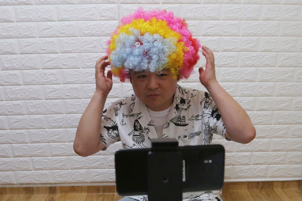 In this July 18, 2019, photo, North Korean refugee Jang Myung-jin films himself in a demonstration of his YouTube broadcast during an interview at his house in Seoul, South Korea. The 32-year-old Jang is among a handful of young North Korean refugees in South Korea who have launched YouTube channels that offer a rare glimpse into the everyday lives of people in North Korea, one of the world’s most secretive and repressive countries. (AP Photo/Ahn Young-joon) In this July 18, 2019, photo, North Korean refugee Jang Myung-jin films himself in a demonstration of his YouTube broadcast during an interview at his house in Seoul, South Korea. The 32-year-old Jang is among a handful of young North Korean refugees in South Korea who have launched YouTube channels that offer a rare glimpse into the everyday lives of people in North Korea, one of the world’s most secretive and repressive countries. (AP Photo/Ahn Young-joon)