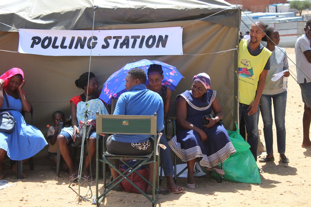 Namibians queue to cast their votes at a polling station near Windhoek, Namibia in the country's elections Wednesday, Nov. 27, 2019. Namibian President Hage Geingob's ruling party faces its biggest challenge since independence nearly three decades ago. The resource-rich southern African nation's registered 1.3 million voters are voting for president and National Assembly members. (AP Photo/Brandon van Wyk) Namibians queue to cast their votes at a polling station near Windhoek, Namibia in the country's elections Wednesday, Nov. 27, 2019. Namibian President Hage Geingob's ruling party faces its biggest challenge since independence nearly three decades ago. The resource-rich southern African nation's registered 1.3 million voters are voting for president and National Assembly members. (AP Photo/Brandon van Wyk)