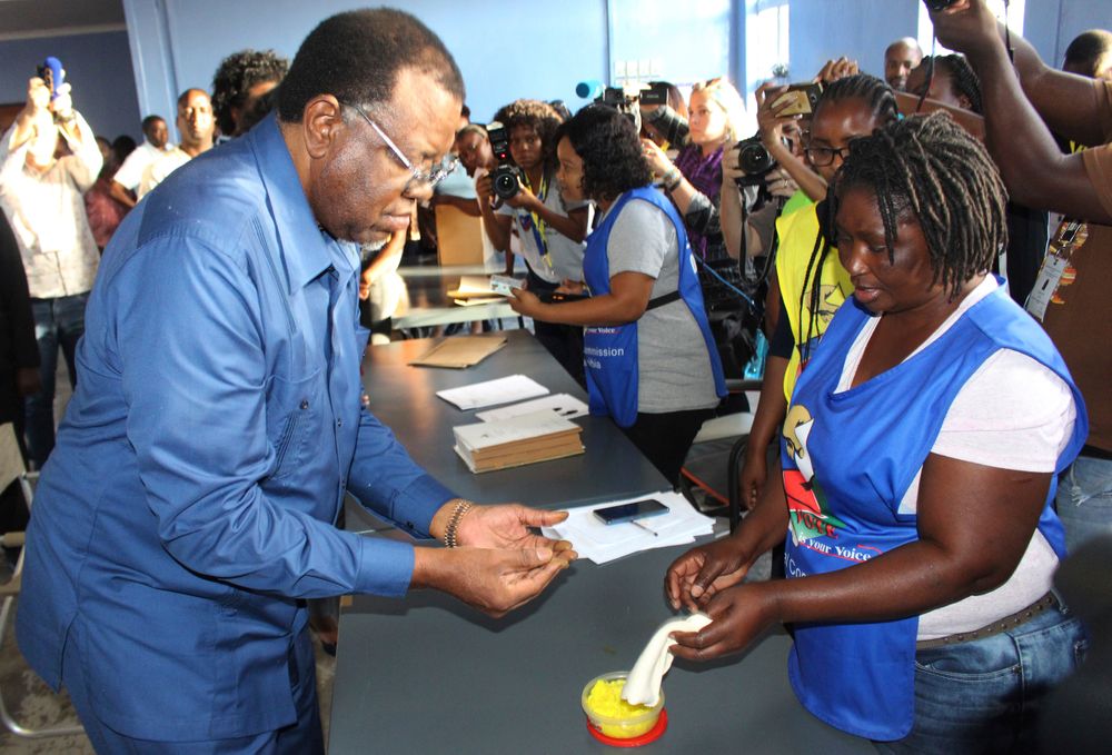 Namibian President Hage Geingob casts his ballot in Windhoek, Namibia in the country's elections Wednesday, Nov. 27, 2019. Geingob's ruling party faces its biggest challenge since independence nearly three decades ago. The resource-rich southern African nation's registered 1.3 million voters are voting for president and National Assembly members. (AP Photo/Brandon van Wyk) Namibian President Hage Geingob casts his ballot in Windhoek, Namibia in the country's elections Wednesday, Nov. 27, 2019. Geingob's ruling party faces its biggest challenge since independence nearly three decades ago. The resource-rich southern African nation's registered 1.3 million voters are voting for president and National Assembly members. (AP Photo/Brandon van Wyk)
