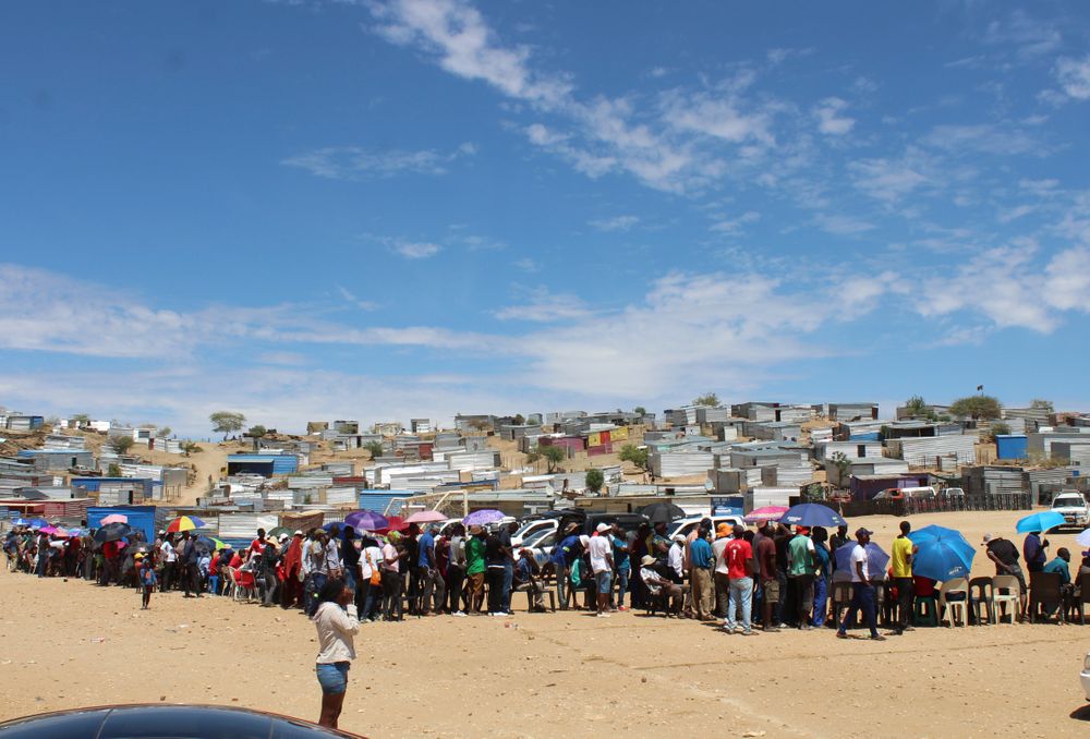Namibians queue to cast their votes at a polling station near Windhoek, Namibia in the country's elections Wednesday, Nov. 27, 2019. Namibian President Hage Geingob's ruling party faces its biggest challenge since independence nearly three decades ago. The resource-rich southern African nation's registered 1.3 million voters are voting for president and National Assembly members. (AP Photo/Brandon van Wyk) Namibians queue to cast their votes at a polling station near Windhoek, Namibia in the country's elections Wednesday, Nov. 27, 2019. Namibian President Hage Geingob's ruling party faces its biggest challenge since independence nearly three decades ago. The resource-rich southern African nation's registered 1.3 million voters are voting for president and National Assembly members. (AP Photo/Brandon van Wyk)